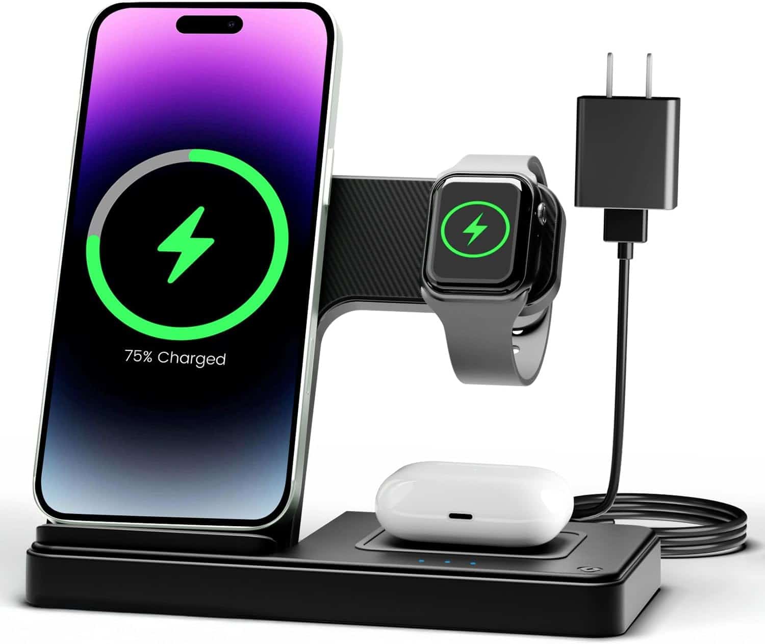 A black wireless charging station holds a smartphone, smartwatch, and wireless earbuds, all charging with visible power indicators; a wall plug is connected on the right.