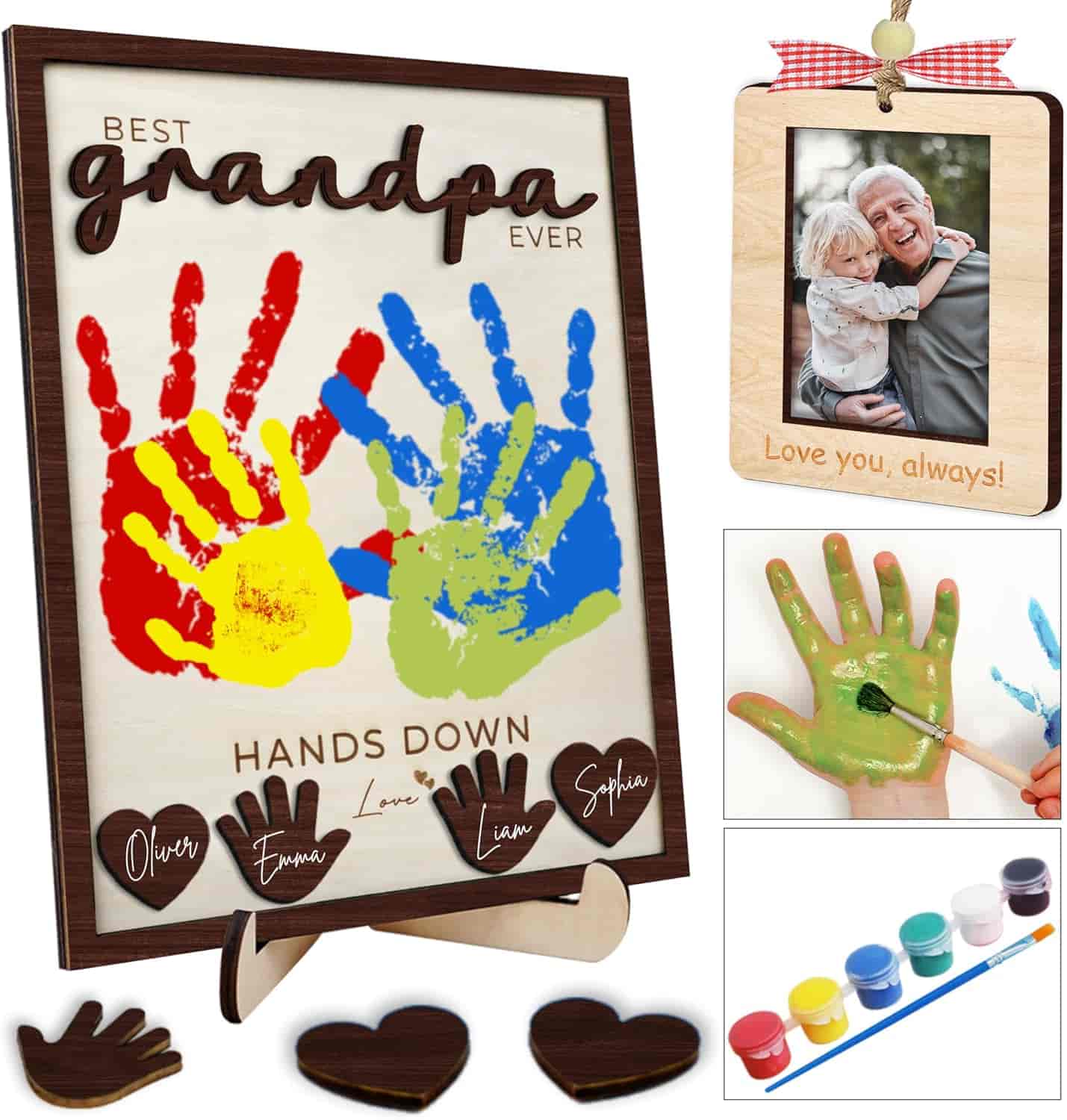 A gift set for grandpa with a painted handprint sign, a photo frame with a picture of an elderly man and child, paint pots, a brush, and wooden hearts labeled with names.