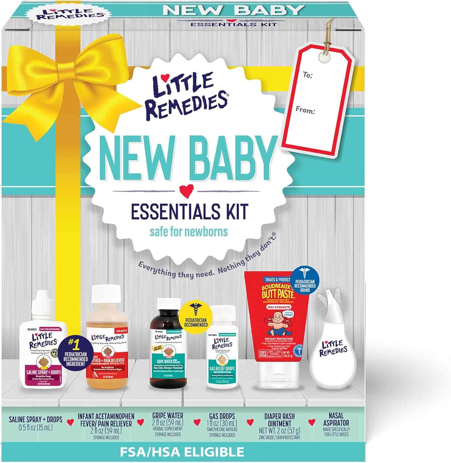 Box of Little Remedies New Baby Essentials Kit with six baby care products visible, including saline spray, gas relief drops, gripe water, diaper rash ointment, and nasal aspirator.