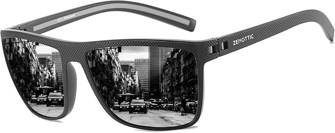Black sunglasses with "ZENTOTTIC" on the arm, showing a black-and-white city street scene with cars and buildings reflected in the lenses.