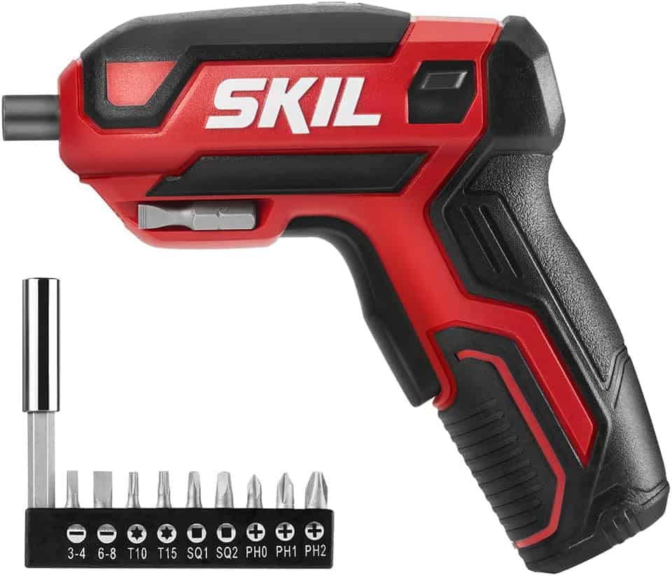 A red and black SKIL cordless electric screwdriver with a set of interchangeable bits and a bit holder displayed below the tool.