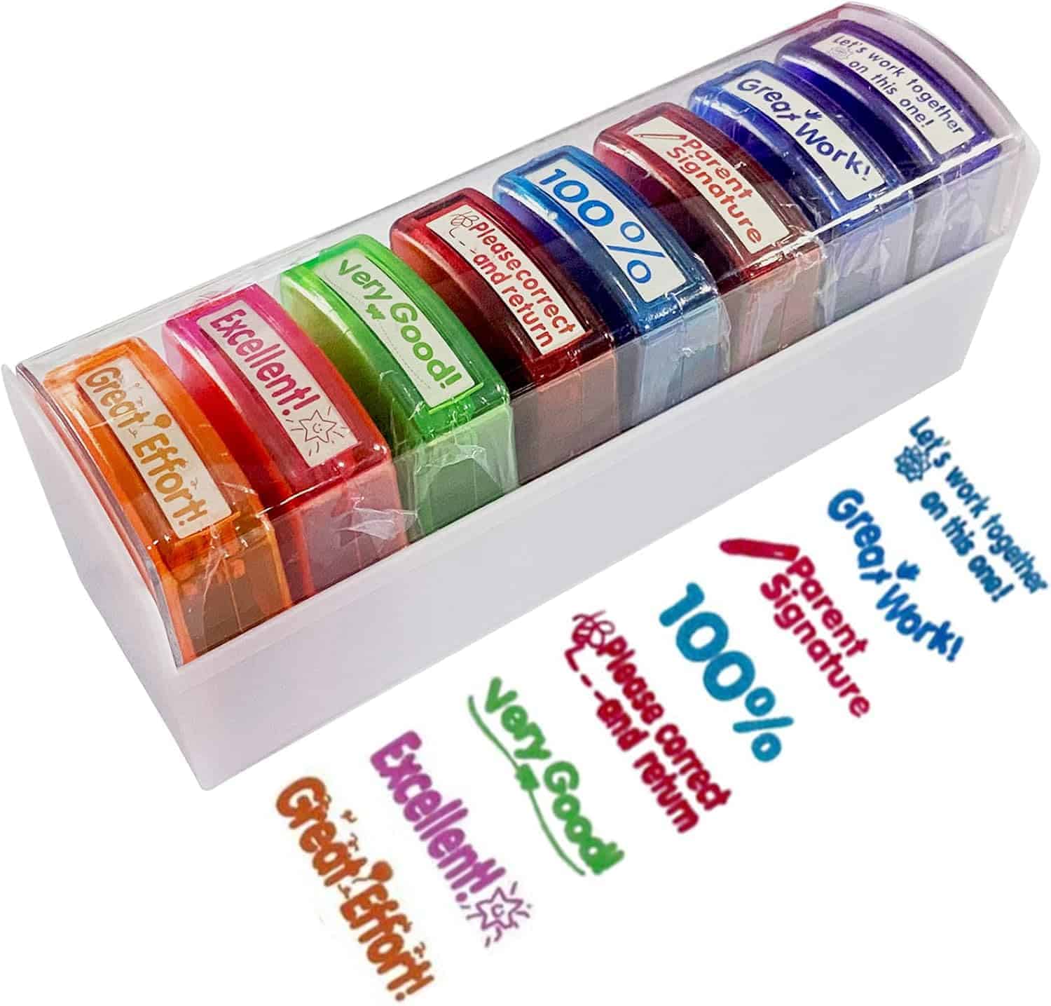 A set of eight teacher stamps in a white holder, each with different motivational phrases, and sample stamp impressions shown in front.