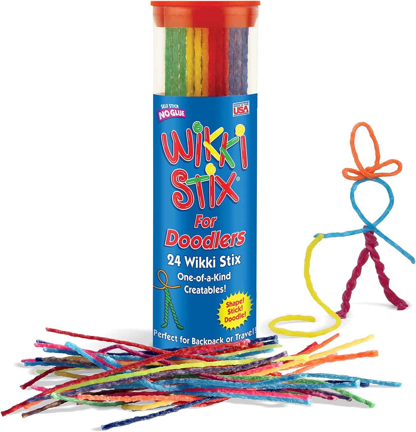 A container of Wikki Stix for Doodlers with 24 colorful wax sticks, some arranged outside, and a small stick figure made from the stix.