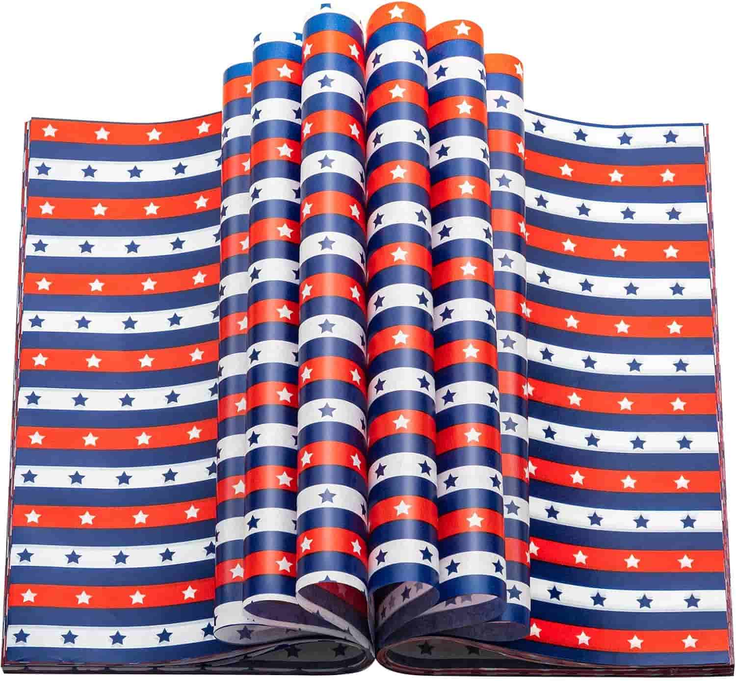 An open book with pages arranged in waves, featuring a red, white, and blue striped pattern with white stars.