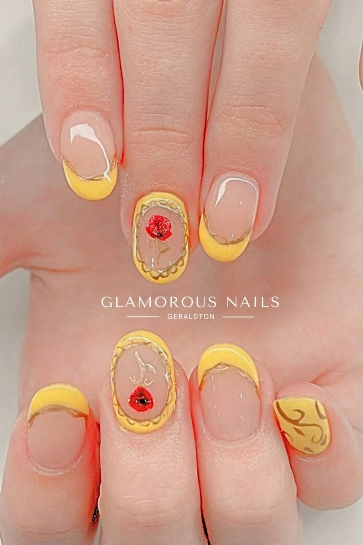 Hands with yellow French tip nails; ring fingers feature a red poppy flower design, and pinky nails have yellow swirls on a yellow base.