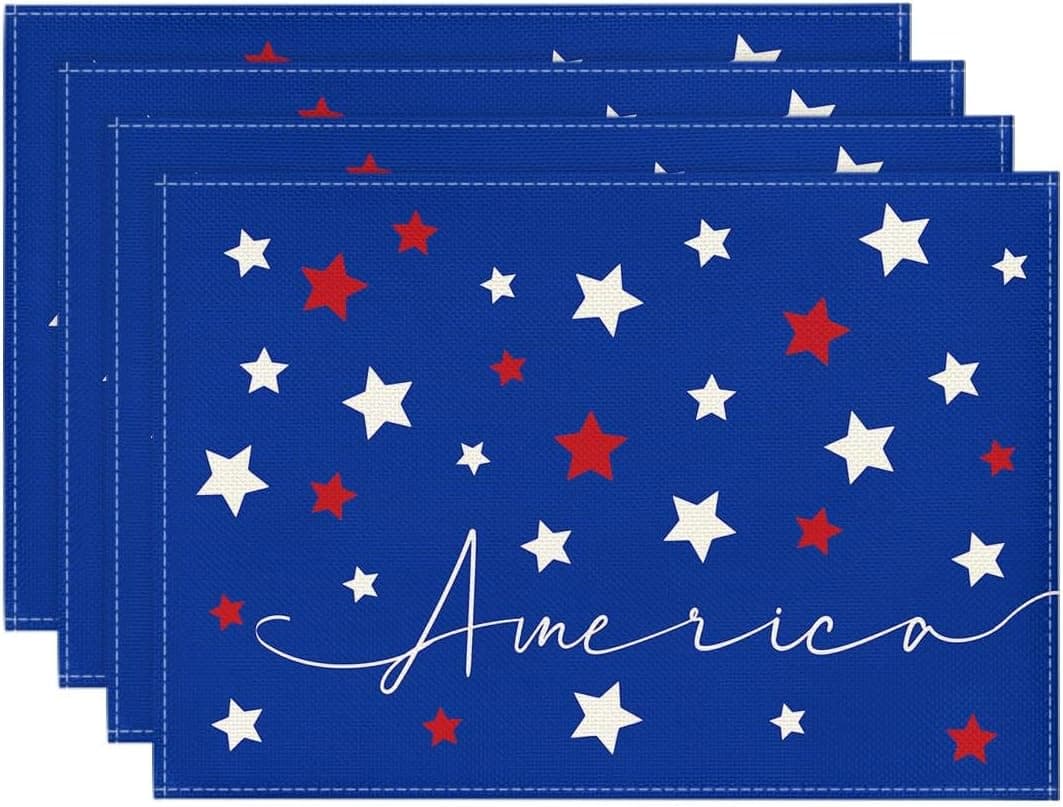 Four blue placemats decorated with white and red stars and the word "America" written in cursive on the bottom part of each placemat.