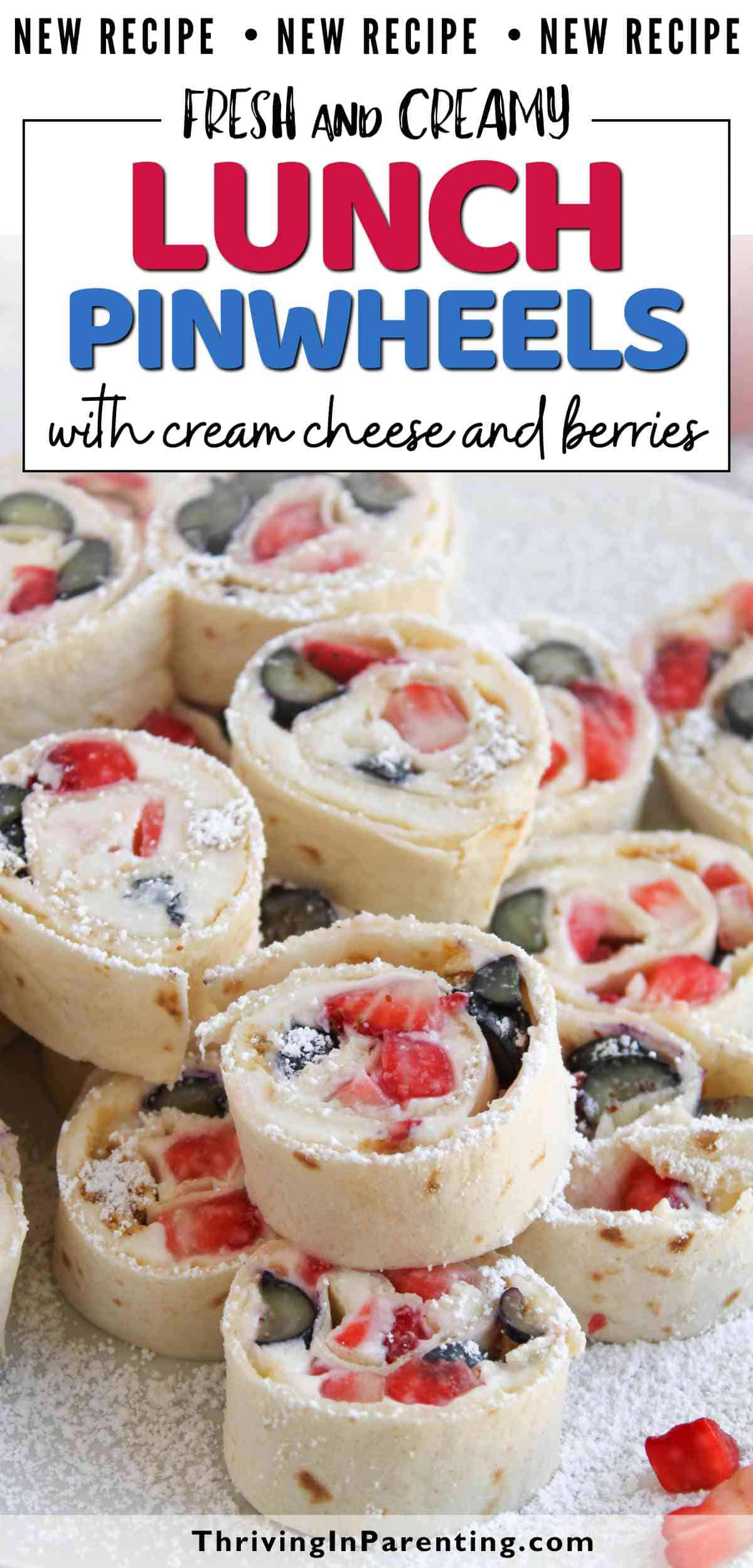 A close-up of lunch pinwheels made with cream cheese, tortillas, and pieces of strawberries and blueberries.