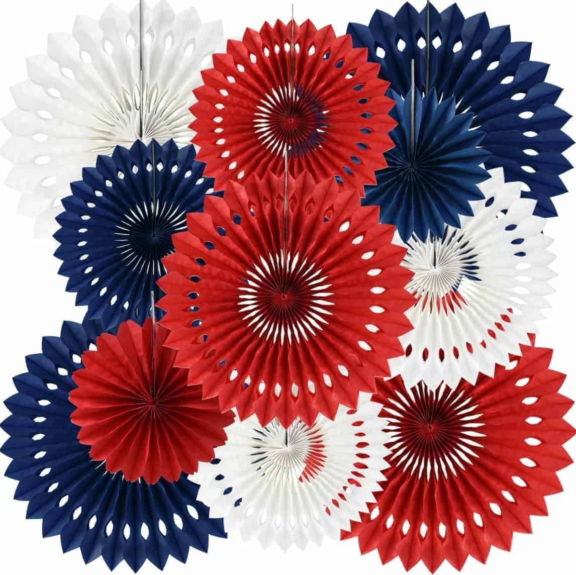 Red, white, and blue paper fan decorations arranged in an overlapping pattern, creating a festive display.