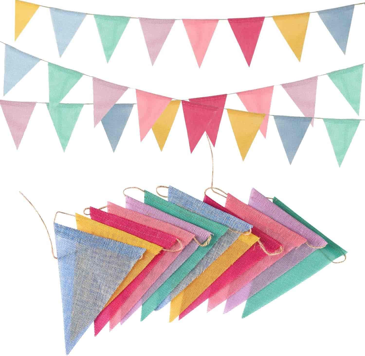 Colorful triangular fabric pennant banners in pastel shades of blue, pink, yellow, green, and purple, strung on twine and displayed in two rows.