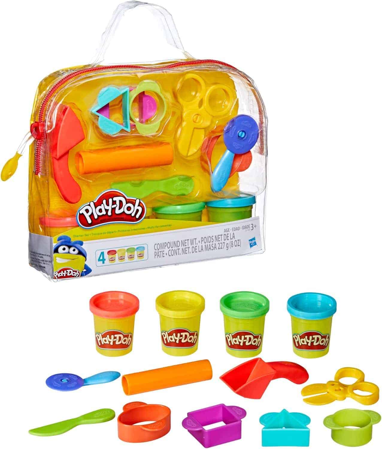 A Play-Doh set with four cans of modeling compound, various plastic shaping tools, and accessories displayed in front of a clear zippered carrying bag.