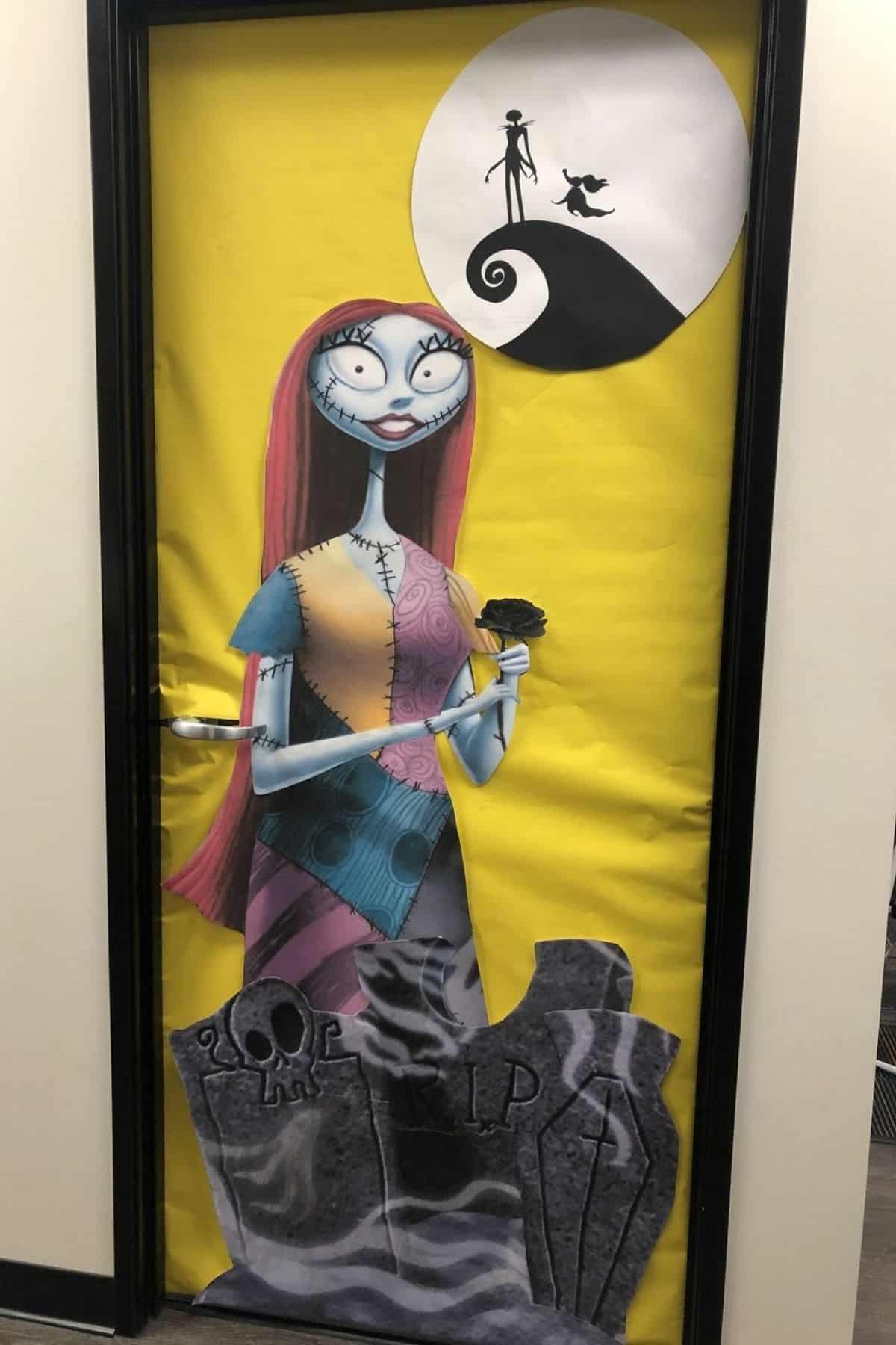 A door decorated with characters and elements from “The Nightmare Before Christmas,” featuring Sally in front of gravestones and Jack and Zero in front of a moon.