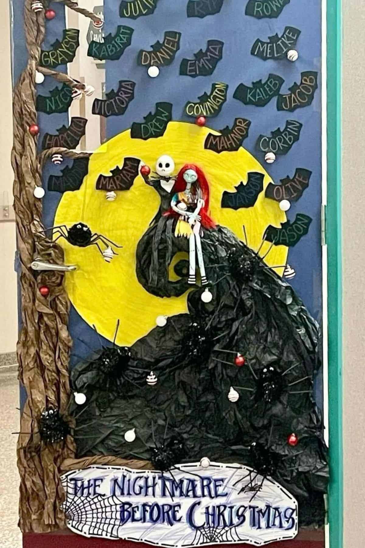 Classroom door decorated with “The Nightmare Before Christmas” theme, featuring Jack and Sally, a large yellow moon, black spiders, webbing, and student names on green and black paper.