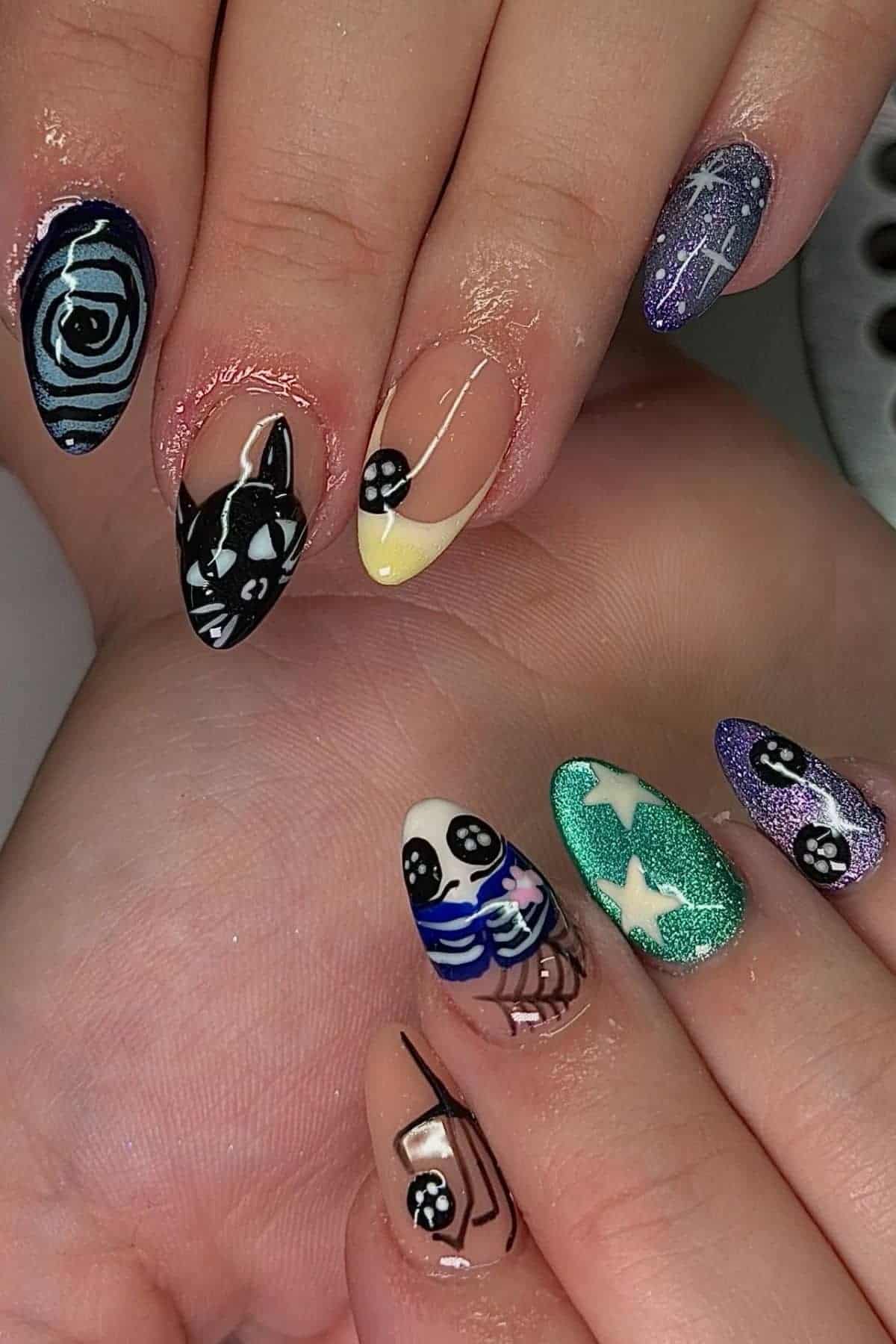Hands with long, manicured nails featuring various colorful nail art designs, including stars, stripes, a rose, cartoon faces, and abstract patterns.